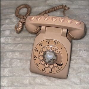 Vintage Rotary Phone with Heart Accents